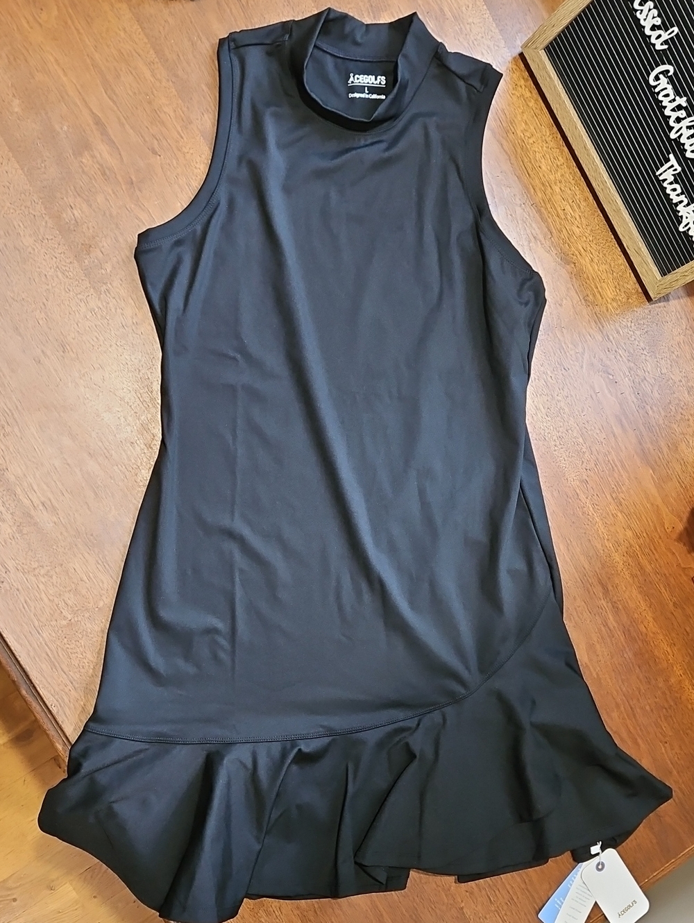 Mock Neck Sleeveless Ruffle-Hem Dress